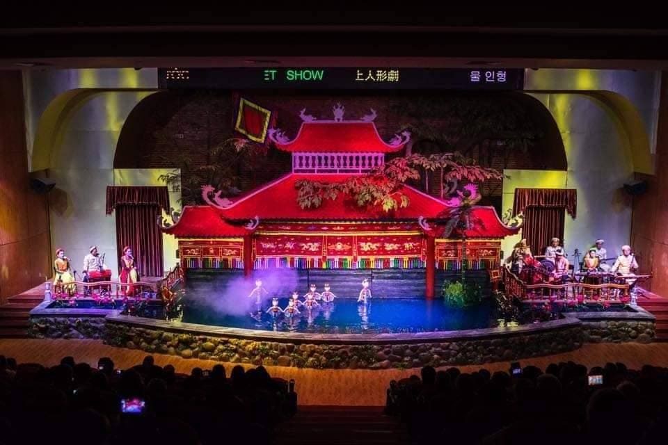 Performing water puppet at Hoa Sen Water Puppet Theatre