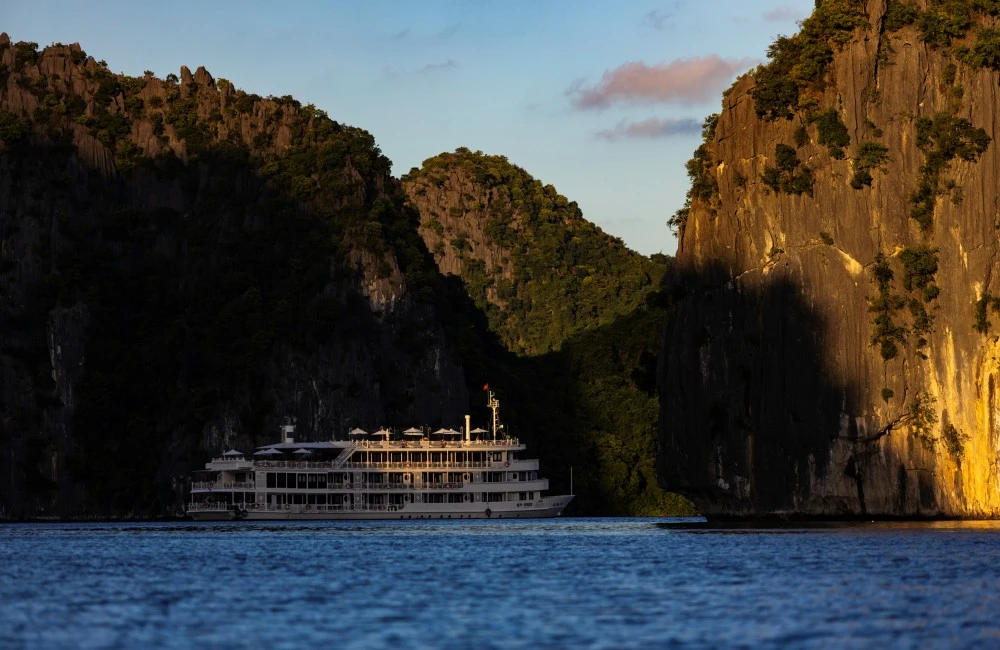 The Au Co Cruise sailing among the limestones of Halong Bay