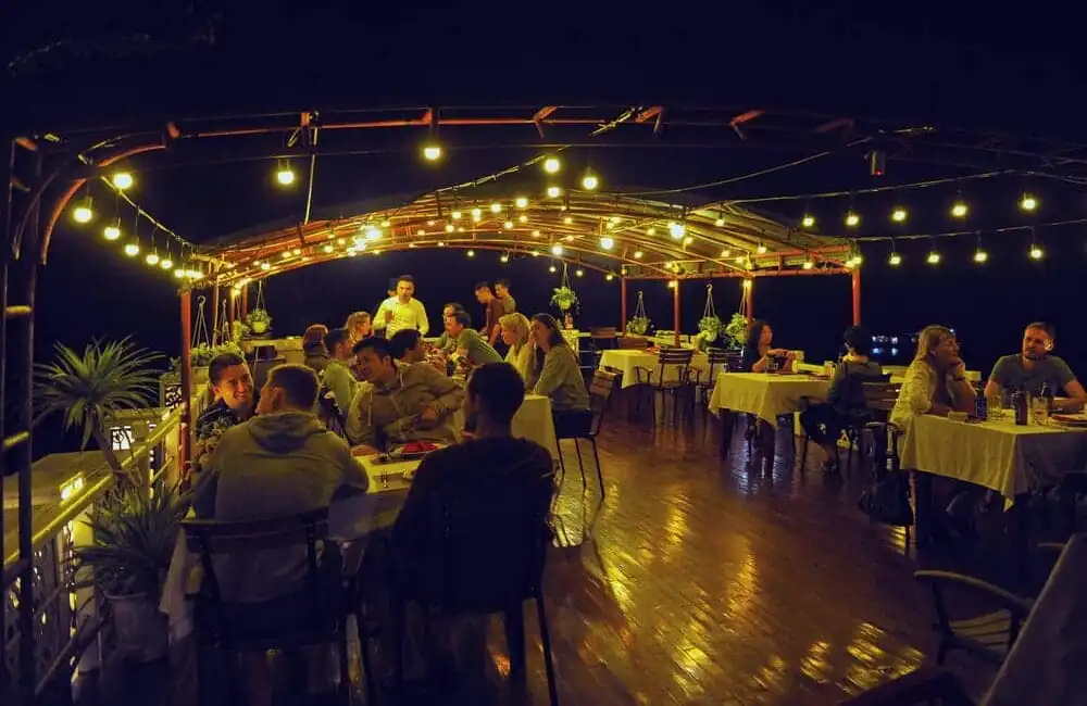 travelers having bbq party on top deck