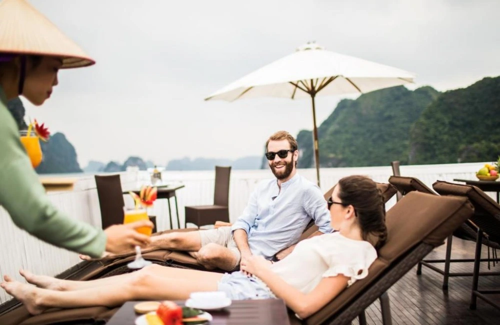 Guest enjoying drinks on sundeck