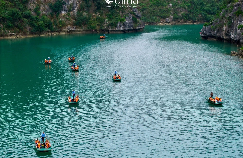 Sailing bamboo boat in Halong Bay