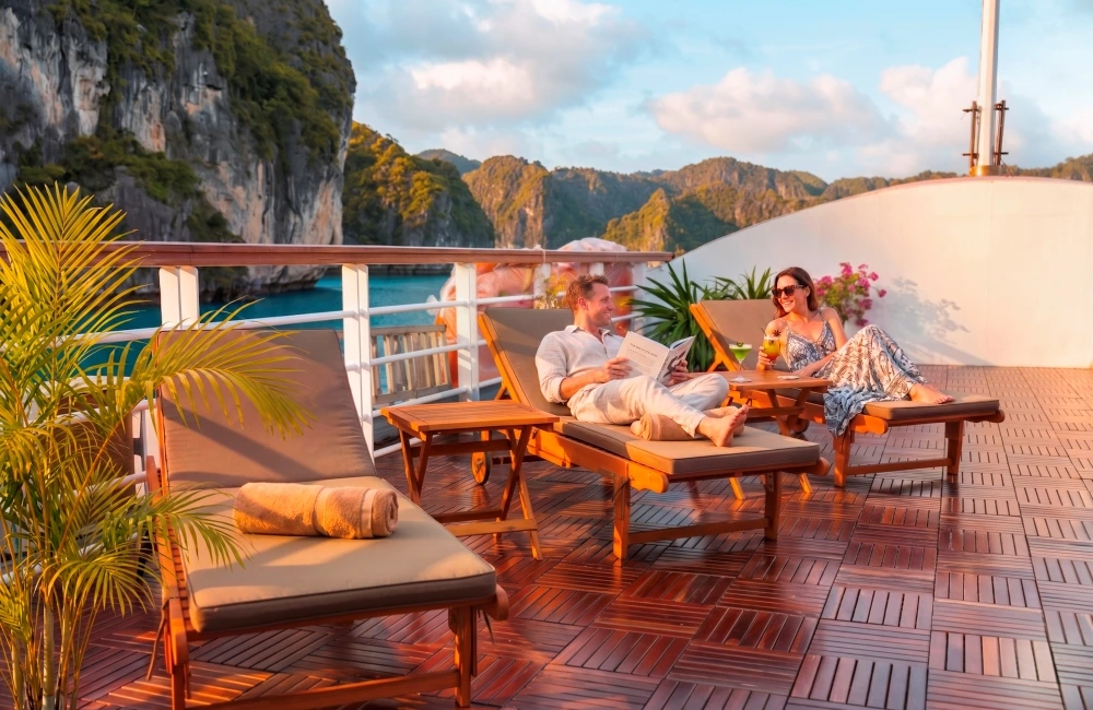 travelers relaxing on sundeck beds