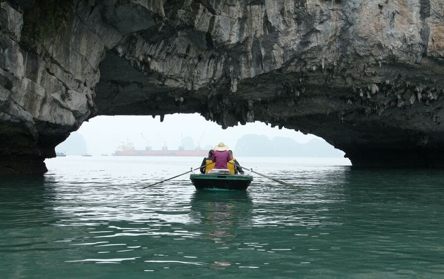 Exploring Cave by bamboo boat