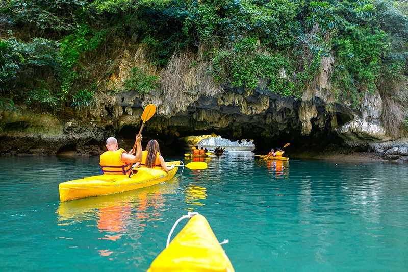 Taking kayaking into Bright Cave